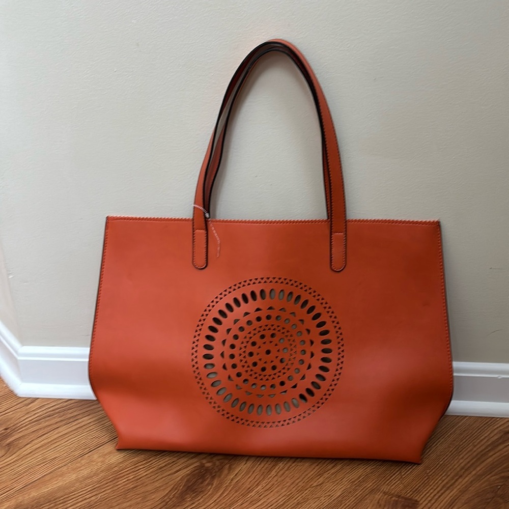 Neimon Marcus orange tote.